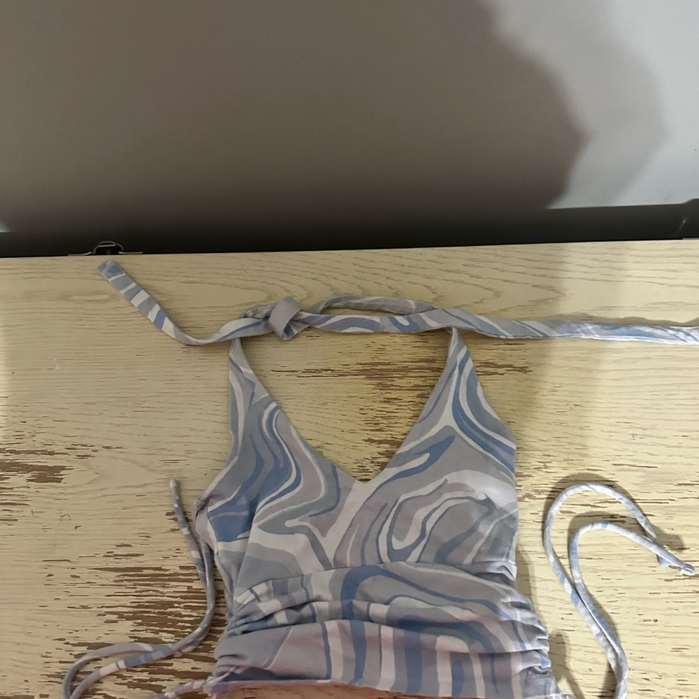 Hollister halter tank top with bow ties on the sides.